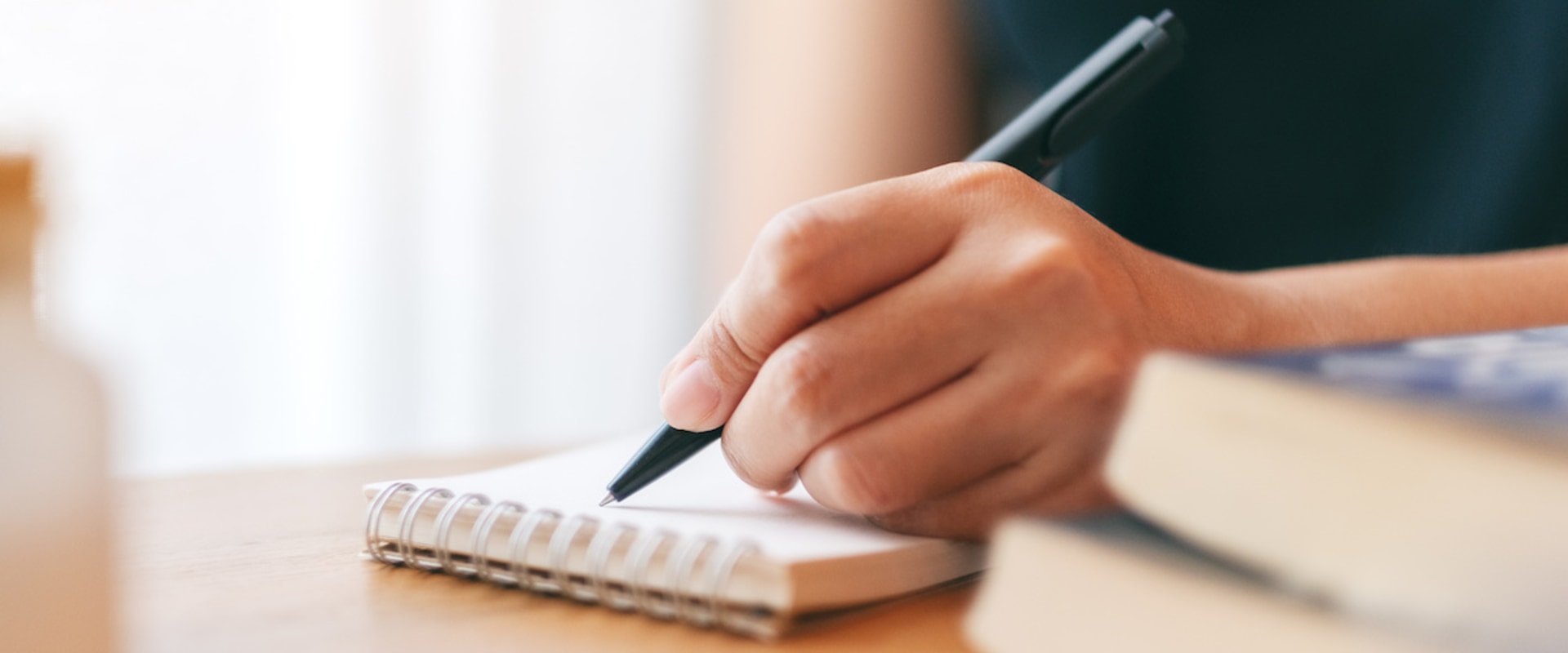 Why is it important to write in third person?